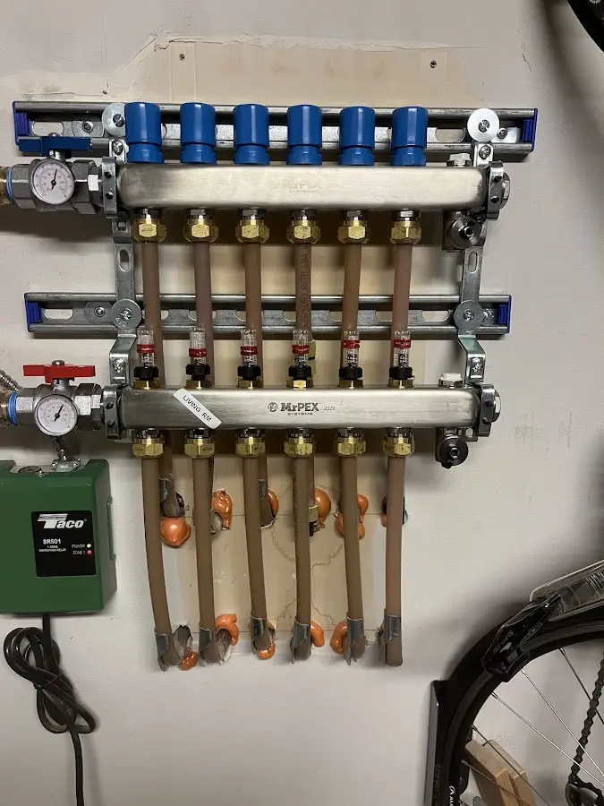 Plumber performing Water Heater Repair at a residential property in Salisbury